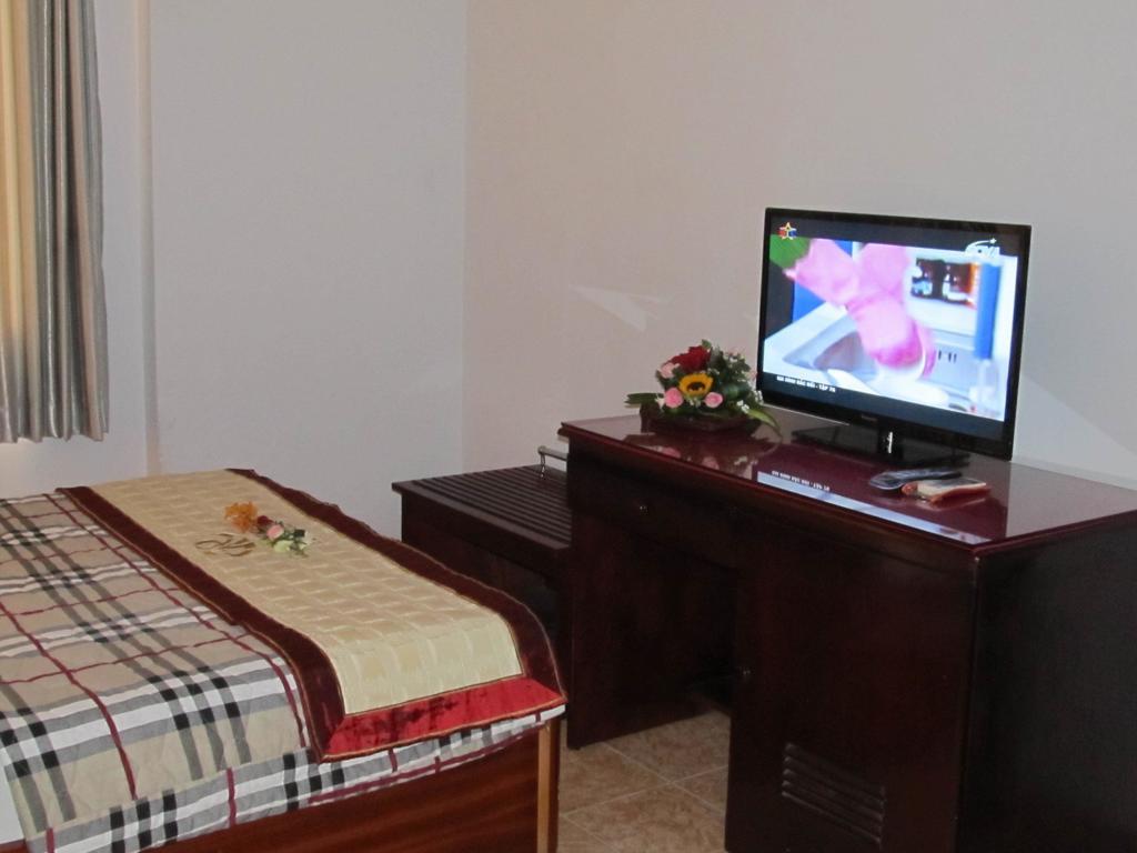 Khach San Trung Mai Cidade de Ho Chi Minh Quarto foto
